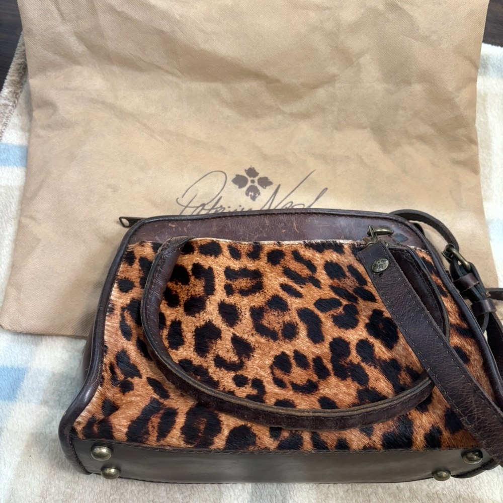 This is amazing purse always received many comments when I carried it.Its unique